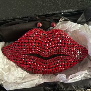 Christal Couture red lip clutch